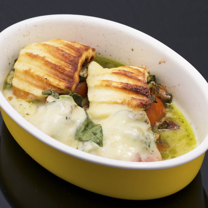 Tomato Rounds with Cheese and Green Topping