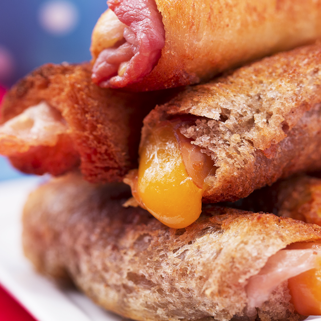 Bread-Wrapped Prosciutto and Cheddar Sticks
