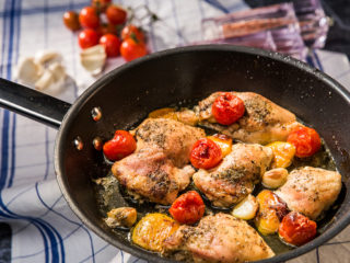 Baked Chicken Thighs with Bell Pepper and Cherry Tomatoes