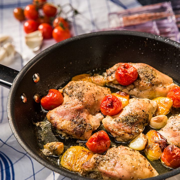 Baked Chicken Thighs with Bell Pepper and Cherry Tomatoes