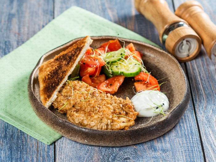 Oat-Crusted Chicken Breast with Tomato and Cucumber Salad