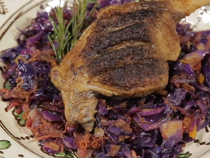 Braised duck legs with red cabbage and carrot
