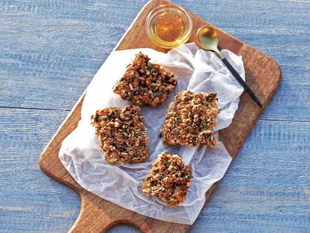 Sweet cereal bars with nuts, seeds, and honey