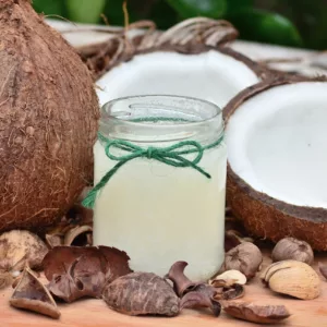 Coconuts and a jar of coconut oil