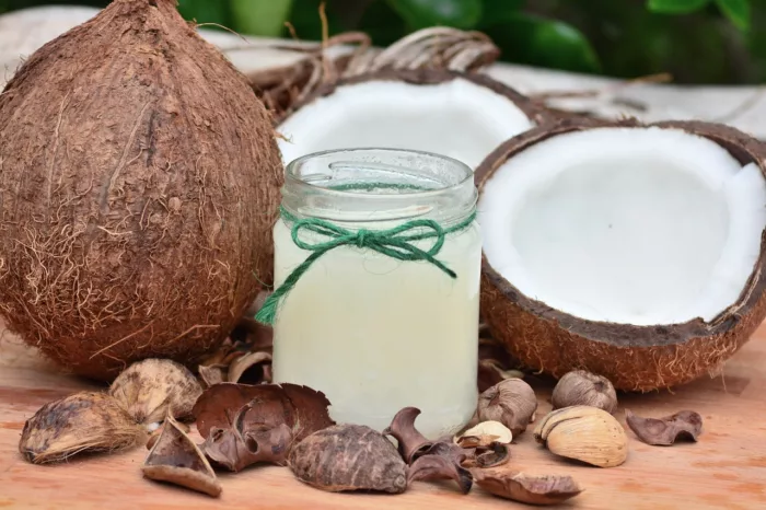 Coconuts and a jar of coconut oil